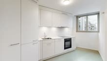 kitchen with modern design, white cabinets, sink, gas stove, oven, built-in dishwasher, under cabinet lighting, large window