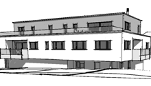 2 story building with several windows, balconies on both floors