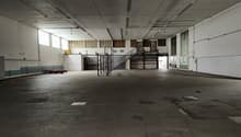 spacious interior, metal staircase, windows, tiled floor, white walls, electrical wires