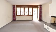 empty room, fireplace, large windows, sliding door, carpeted floor