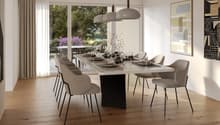 wooden floor, white walls, large glass doors to terrace, modern dining table, chairs, lamps, decor