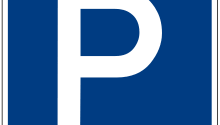 Blue rectangular sign with a white 'P' symbol indicating a parking area.