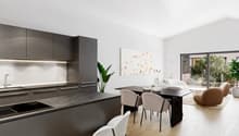 modern kitchen with marble countertop, stainless steel appliances, large dining table, modern chairs, white walls, wooden floor, large windows, plants