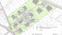 Building plot with various reserved areas, a building line, and a building for sale.