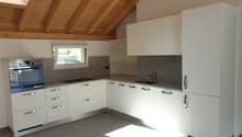 modern kitchen, white cabinets, marble countertop, stainless steel oven, granite floor