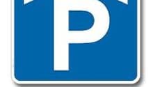 Blue square sign with a white house icon and the letter P