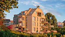 4 story apartment building, large windows, balconies, beige walls, rooftop terrace