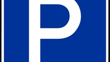 Blue and white sign with a white letter P