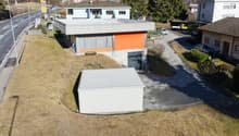 Modern style house, gray roof, orange part, 2 stories, garage