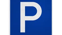 Blue square sign with white letter 'P' indicating a parking area