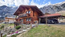 wooden chalet, 2 story, balcony, garage, mountain view