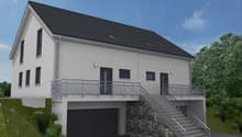 2-story house with a gray exterior, black roof tiles, large windows, balcony, and a garage on the ground floor.