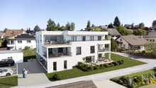 Modern white house, 3 stories, multiple balconies, car parking