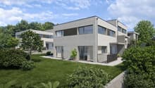 modern apartment building, 2 levels, large glass windows, concrete exterior, landscaped garden, two balconies, potted plants