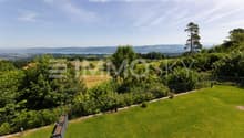 Aussicht auf Garten mit See Panorama