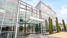 modern office building, glass facade, large entrance, glass doors, glass walls, modern design
