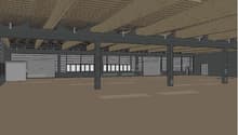 Spacious room with high ceilings, large windows, and metal structural supports