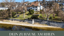 Houses on the riverside, with a view of the river and the town