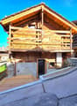 wooden chalet, wooden balcony, stone wall, driveway