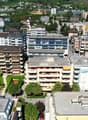 Place de parc à Sierre - Vue drone / Parkplätze in Sierre - Drohnenaufnahme / Parking Spaces in Sierre - Drone View