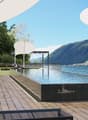 wooden deck, swimming pool, lounge chairs, umbrellas, lake view, mountains