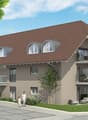 2 story house, brown roof, beige walls, large windows, balconies, parking area, garden, trees