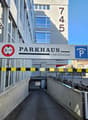 Entrance to a parking house with 'Parkhaus' and 'Laborgasse' sign