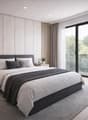 modern bedroom with gray carpet, wooden bed, two nightstands with lamps, large window with balcony access, potted plants, and a curtain
