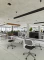 white desks, grey chairs, various plants, large windows, monitors
