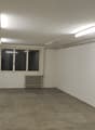 empty room, white walls, white ceiling, radiator, window, grey floor