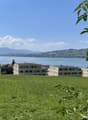 Building on a hill overlooking the lake