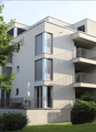 modern apartment building, white exterior, multiple balconies, green surroundings