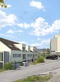 The image shows a residential development with several multi-story apartment buildings. The buildings have a modern, minimalist design with a mix of light and dark colors. There are parking spaces visible in front of the buildings, and people can be seen