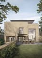 modern style house, multiple glass windows, beige walls, outdoor dining table, green lawn, terrace, trees in background
