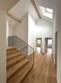 interior hallway, wooden stairs, ceiling with skylight