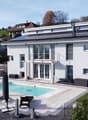 modern house, solar panels, swimming pool, jacuzzi, garden, lounge chairs, umbrellas