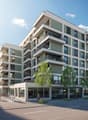 Multi-storey building, balconies, glass windows, parking area