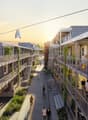 An artist's impression of an apartment complex with raised ground floor and terraces.