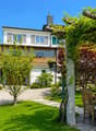 Aussenansicht und Garten mit Pergola