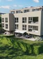 3 story residential building with 2 balconies, canopy, open terrace, garden, and outdoor furniture.