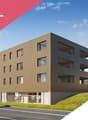4-story apartment building with a modern, wooden exterior design. The building has multiple balconies and large windows. There is a car parked in front of the building, and the surrounding area appears to be a residential neighborhood with trees and green