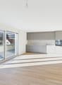 wooden floor, large windows, balcony, sliding glass doors, modern kitchen, white walls