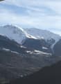 Snowy mountains under a blue sky