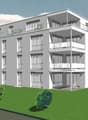 multistory building, white, many balconies, large windows, set in a green field