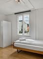 Schlafzimmer für eine Person mit Kleiderschrank