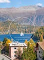 Panoramic mountain view, lake, village, trees, houses