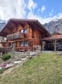 wooden chalet, 2 story, balcony, garage, mountain view