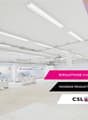 spacious industrial property with white walls, white ceilings, white floors, white industrial machines, bright lighting