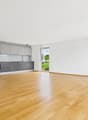 Wohnzimmer mit offene Küche