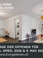 Modern open plan room with white walls, hardwood floors, contemporary furniture, large windows, appliances, and plants